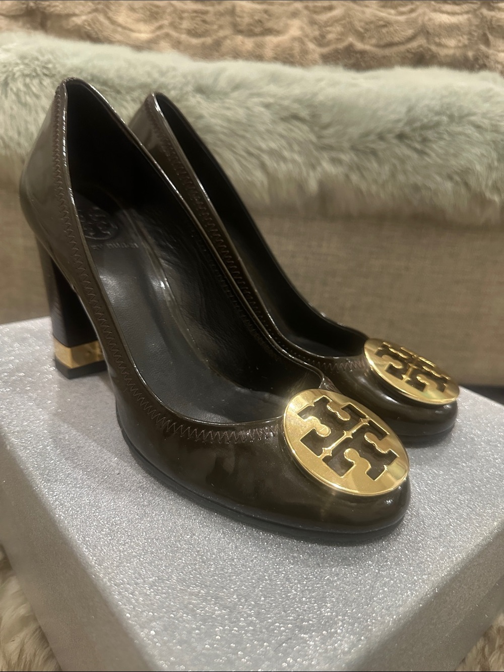 TORY BURCH Brown Patent Leather gold Logo Block Heel Pumps w/ gold adornment.